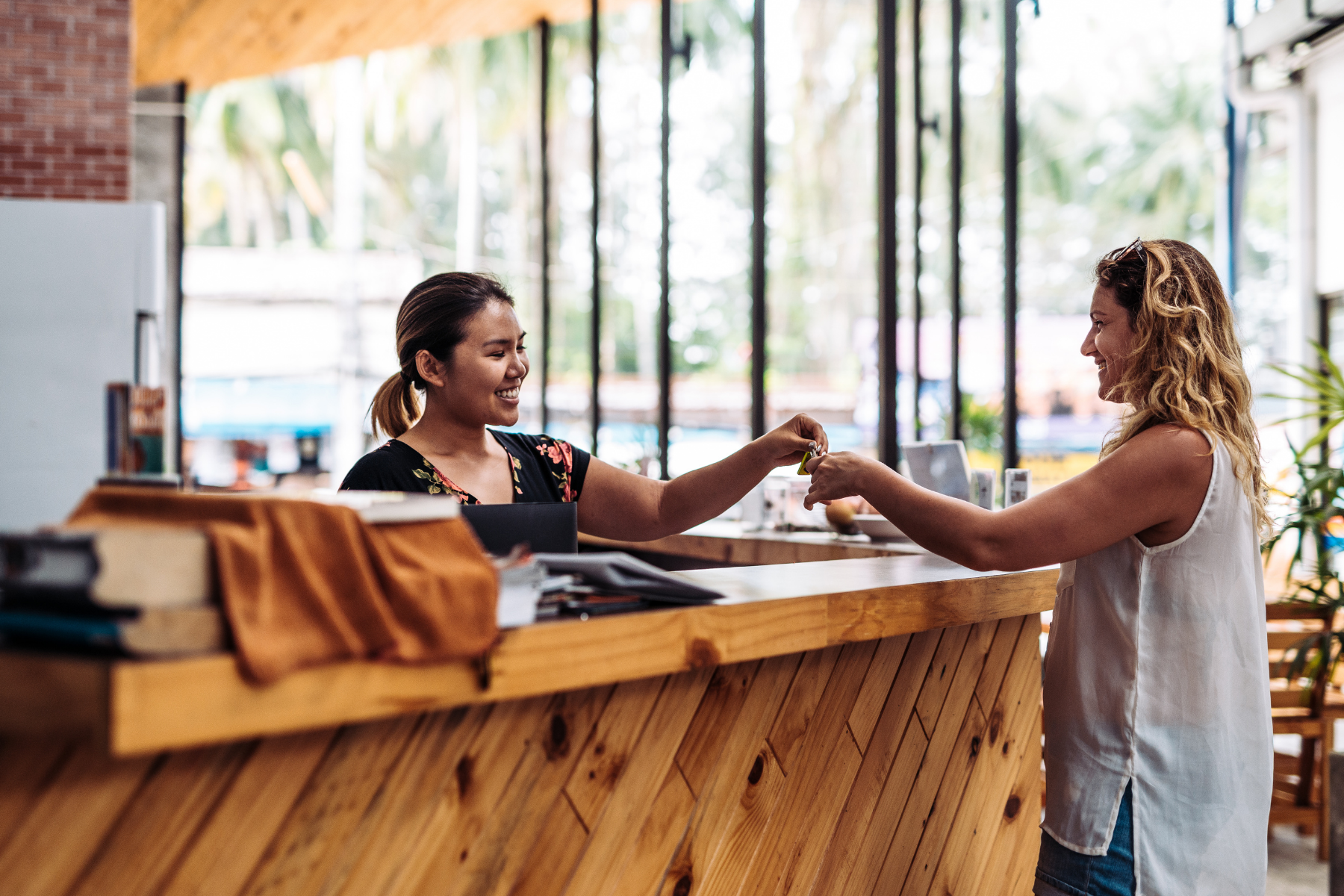 A customer arriving at the front desk.