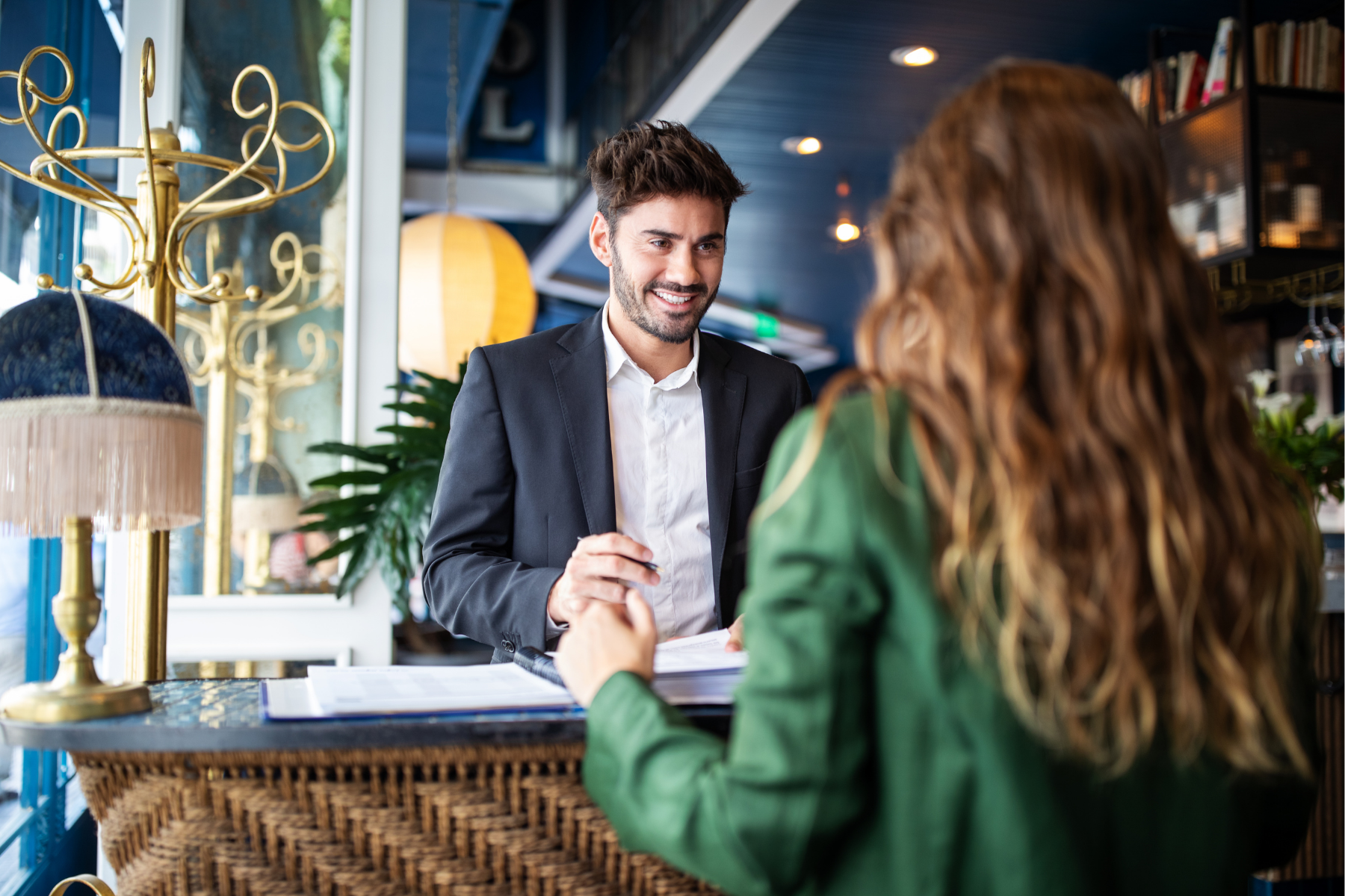 A customer arriving at the front desk.